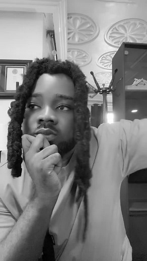 Captivating Indoor Tune Performance with Dreadlocks