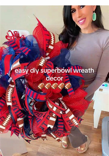 Super bowl wreath using deco mesh and bold ribbons! The perfect wreath base for game day decor and Super Bowl parties 🏈 #superbowl #football #diy #wreath #wreathmaking