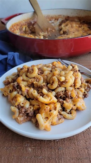 This easy macaroni and ground beef casserole has tomato sauce and onion soup mix for a bold savory flavor. This recipe is from my grandma’s recipe box and is a great way to get dinner on the table for your family. | Cooking With Carlee
