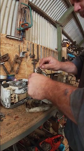 reassembled a chainsaw starter spring
