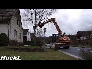 Bagger mit Baumschere | Hückl Lohnunternehmen Bastheim OT Braidbach