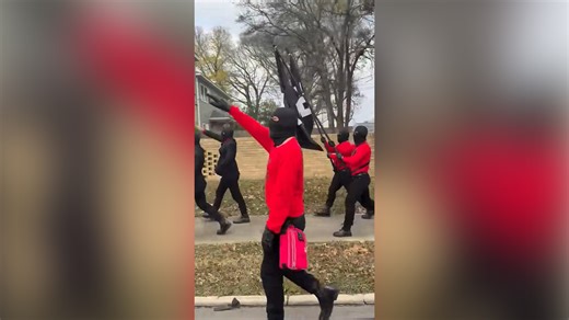 Masked neo-Nazis march through Arkansas community