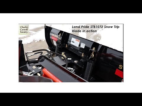 The Land Pride STB1072 Snow Trip Blade in Action with the Kubota B3350