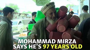 27K views · 309 reactions | Mohammad Mirza cuts a striking figure on the streets of Kabul, Afghanistan, bristling with bright green plastic watering cans that he sells to passers-by. He says he's 97 years old. | Voice of America | Facebook