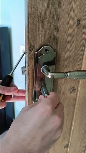How to Attach a Door Handle When the Lock Mechanism Blocks It