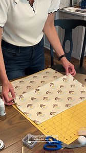 Fake it 'til you make it: window treatment edition. :-) Here's how to do it: 1. Cut the fabric at least 2" wider than the window width, and at least 10" longer than the desired length of the finished shade. 2. Glue side hems. It helps to iron them flat and then glue them down with permanent fabric glue. 3. Glue a top hem where your tension rod goes through. Make sure NOT to glue the ends of this hem so you can place the tension rod when it's time to hang. 4. Create the first pleat by pulling fab