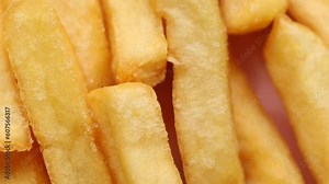 Delicious french fries , rotation in circle. Frires (fast food) Turning. selective focus