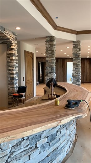 Peter Erdei on Instagram: "Made this cool Custom Bar top for a client in Tennessee. I had intall it in place and I used a hard wax oil. the countertop has a natural curve for the wall you see below the top. #customade #customdesign #customwoodworking #customfurniture #bespokedesign"