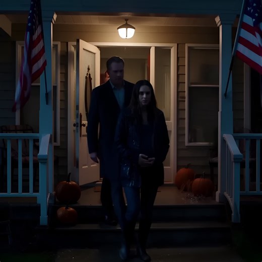 My husband and his mother left me outside in the cold rain when I was six months pregnant. Through the glass, I knocked and called out until the lights went dark. At midnight, I returned—with someone they didn’t expect. When the door opened, my husband fell silent, and my mother-in-law’s glass slipped and shattered as she recognized the man. Through the frosted glass of a neat American porch—flag snapping in the storm, pumpkins still soft on the steps—they watched me beg until the hallway light 