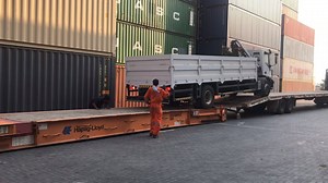 Loading of IVECO Truck on Flat Rack containers for the purposes of shipping to its Final Destination. | Multitrans Logistics