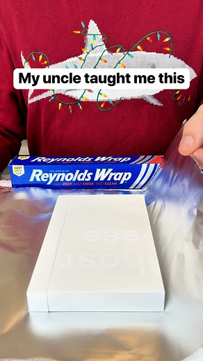 I use foil to wrap presents when in a pinch. This original video was produced by Network Media LLC, and Liz & Jeff. #foil #uncle #wrapping #christmas | Home Hacks & Easy Snacks