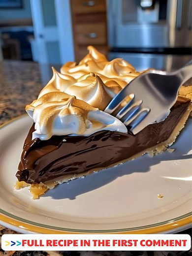 Old-Fashioned 🚎 Chocolate Pie with Golden Meringue ☁️ Rich, creamy, and finished with a dreamy toasted meringue—this classic pie is a showstopper for any dessert table! Ingredients : * 1 pre-baked 9-inch pie crust * 1½ cups granulated sugar * ¼ cup unsweetened cocoa powder ..... Full Recipe in Coʍmеոτ 💬 💘 | The Storybook Of Pixels and Colors