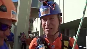 15K views · 172 reactions | Wearing a Denver Broncos jersey, Colorado Governor John W. Hickenlooper rappelled down a 32-floor building in Denver to raise money for the Cancer League of Colorado. | POLITICO | Facebook