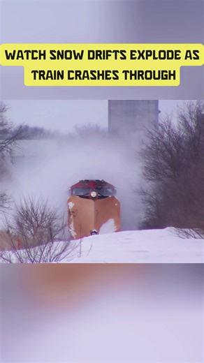Watch snow drifts explode as train crashes through #steamengine #locomotive #snowcrash #fyp