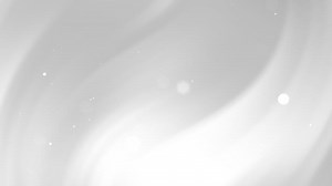 White background with soft gray gradient and white bokeh.