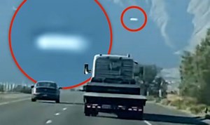 California: White disk spotted floating above Highway 62