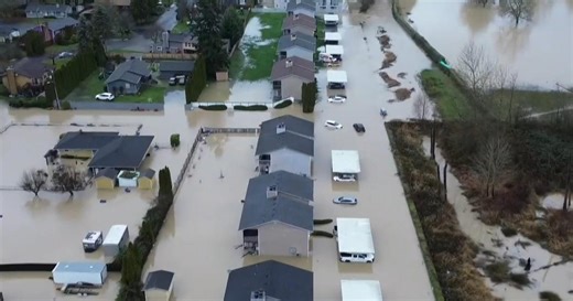 Homes swamped after levee is breached in Washington state