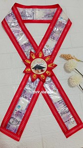 132K views · 515 reactions | STEP BY STEP VIDEO TUTORIAL https://youtu.be/0b4AUaeIqCc?si=Qy00H5IDk9_IE_g2 #moneysash #moneygarland #diy #giftidea #diyideas #graduation #graduationday #graduate #Graduation2025 #reelsviralシ #reelsvideoシ | DIY IDEAS | Facebook