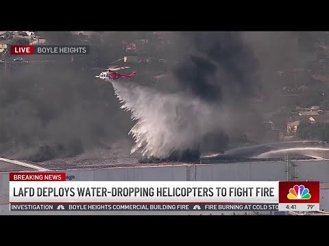 Helicopters make precision water drops on Boyle Heights fire