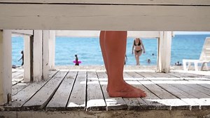 Woman Changing Dressing Room On Beach Stock Footage Video (100% Royalty-free) 3513640171 | Shutterstock
