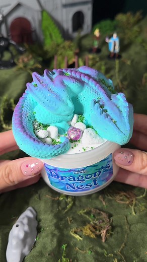 Dragon's Nest 🐉 A DIY butter slime that comes with a sleeping dragon add-on and butter slime base! I'm in love with this slime's elderberries & boysenberries scent 7 NEW Legend of Snoop slimes release on Friday, 6.14.24 at 6pm CT / 7pm ET #fantasyslimes #slimeasmr #snoopslimes