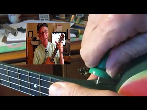 I attach a strap button on ukulele neck without using a drill.