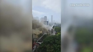 Miami firefighters battle massive apartment fire