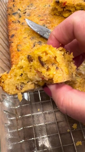 Momma’s Mexican Cornbread has always been a favorite among family and friends for as long as I can remember. 🥰 #mexicancornbread #mommasrecipe #FamilyRecipes Mom’s Mexican Cornbread 1 C Cornmeal 1 1b bacon (cooked and crumbled - reserve drippings) 1 C shredded American cheese 1 can of cream style corn 2 eggs 1/3 C bacon drippings (or oil) 1 C Milk 1/2 tsp baking soda 1/2 tsp salt Diced jalapeno peppers (fresh or pickled) Mix all ingredients well. Bake in a greased 9x13 pan at 350 for 30-40 min.