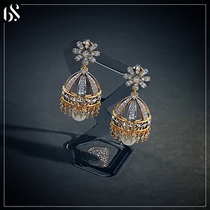 2.2K views · 2.6K reactions | Elaborate Jhumka or simple Diamond Stud Earrings? You make the choice with the chic Shreyasi Detachable Jhumka  0% Making Charge on Diamond Jewellery. Visit our website now to check out more beautiful diamond jewellery designs. | BlueStone | Facebook