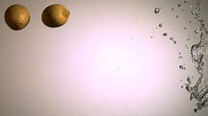 Download Water splash with fruit in ultra slow motion 1,500 fps on a reflective surface - WATER SPLASH w FRUIT 006 for free