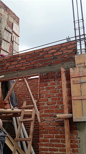 installation of red bricks on hanging beams #redbricks #construction