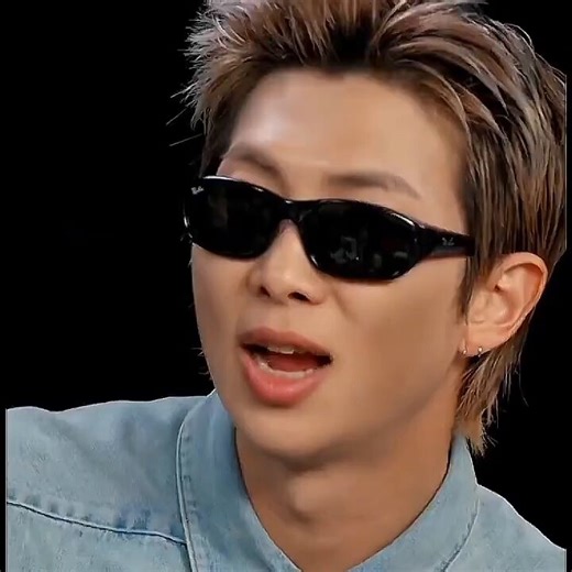 This close up... the way his lips move, his Adam's apple and his small earrings just being cherry on top