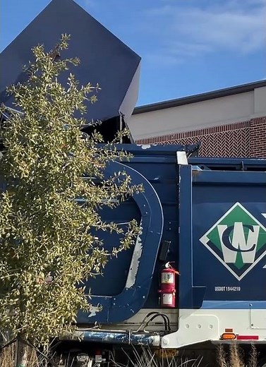 Waste connections front loader