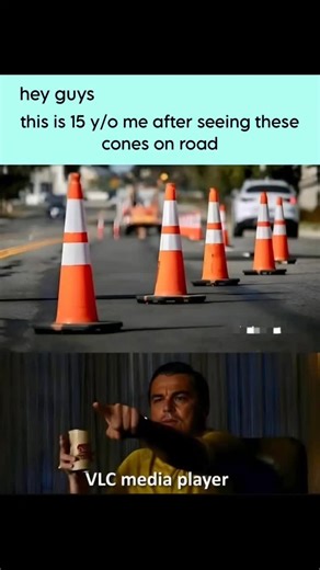 hey guys on Instagram: "hey guys This is 15 y/o me after seeing these cones on the road… Brain instantly goes: “WAIT… why do these look familiar?” 👀 Memory loading… Windows XP startup sound 💀 Suddenly I’m not on the road anymore… I’m on my laptop, volume at 100, watching movies on VLC media player like it’s premium cinema 😭🍿 These cones really said: “Free movies. No ads. No subscription.” And my childhood said: YES. Every cone is a flashback. Every orange stripe is nostalgia. If you know, yo