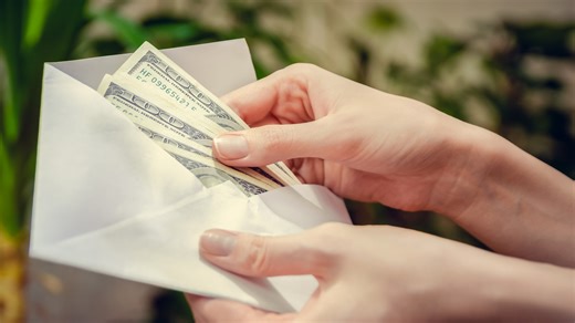 Save over $5k in 100 days with this New Year's envelope money challenge
