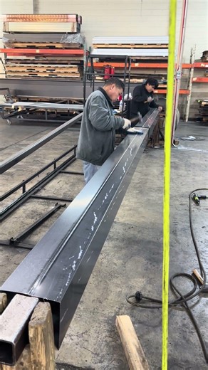 Connecting commercial downspout together. Old school .