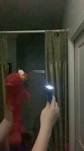 elmo world flashlights thing