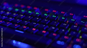 Gaming Keyboard With Rainbow of Colors Letters. PC RGB Keyboard is Glowing Neon Colors. Modern Backlit Keyboard With Pulsating RGB Colour Light. Cyber Sport Illuminated Mechanical Gaming Keyboard.