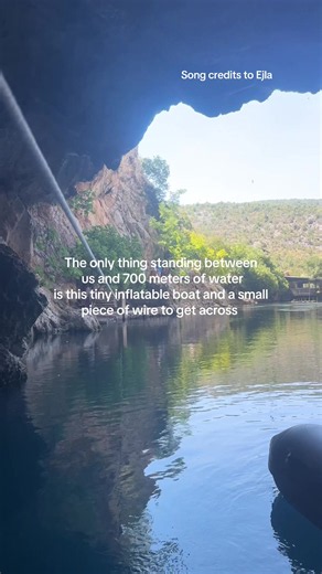 Eastern European summer crossing: tiny boat over 700m gorge