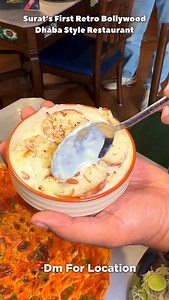 Ahmedabad’s ICONIC restaurant serving delicious comfort Veg and Nonveg food in SURAT!! I tried: Lasooni Paneer, Handi Ghost, Karari Roti, Onion Cheese Chaska, Tandoori Stuffed Mushroom, and Masala Chaas. . Dessert : Baked Gulab Jamoon & Kesar Jalebi With Rabdi . Each dish had an authentic, rich taste that truly stood out flavourful, comforting and absolutely delicious. Do comment for the restaurant’s name! Follow me for more gorgeous food reels @the_foodaddict_surat . (Nonveg Restaurant, Indian 
