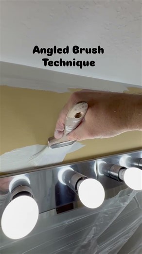 POV Interior Painting: Cutting Ceiling Line Above Light Fixture in Brunswick OH