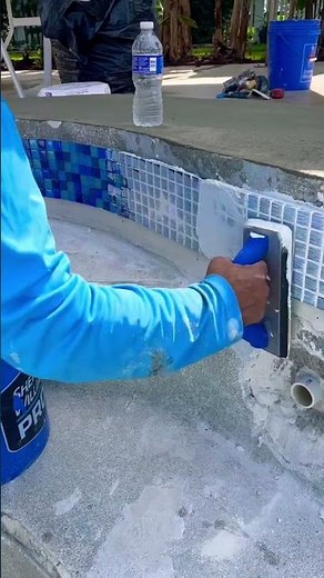 Beautiful pool mosaic tile installation