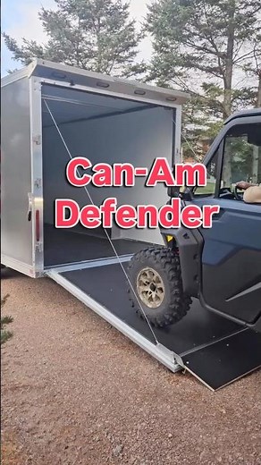 Can-Am Defender being loaded into a new 2026 Ideal Cargo 8.5 X 20 Evocore enclosed trailer.