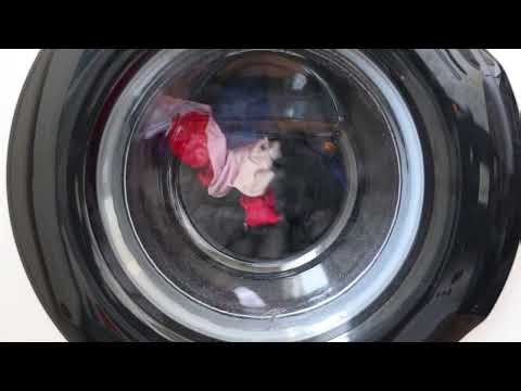 The last 14 minutes of the washing cycle including spinning
