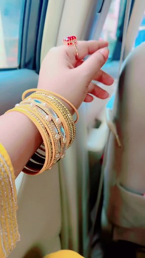 Colorful Bangles Showcase on Stylish Car Interior