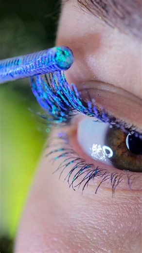 MTcosmetics on Instagram: "Lash Trip Mascara — Helsinki Icefield Icy, luminous reflections shifting from green to violet depending on the angle🧞‍♂️ With @cam.mkp #mascara #glitter #makeupartist #multichrome"