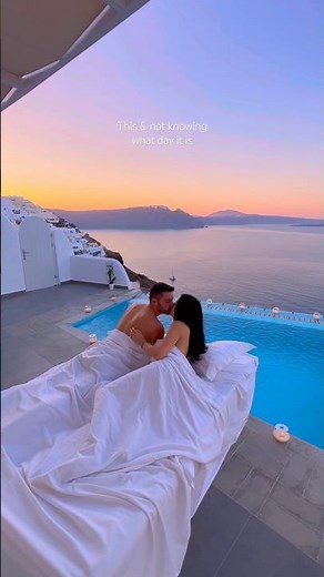 Imagine waking up to breathtaking caldera views in Santorini this summer! 🌹🥂 #santorini #couple