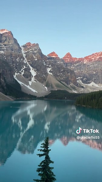Experience the Serenity of Moraine Lake at Sunrise