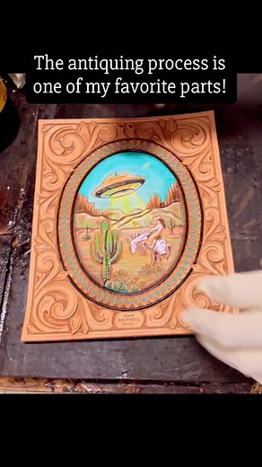 8.1K views · 845 reactions | Applying antique paste brings definition to the leather tooling. It is one of my favorite parts of the process because that’s where the piece really comes to life! I promise these projects are so much prettier in person too! Alien notebook cover available on my website December 3rd, 10 am pacific time!! www.clairkehrberg.com #clairkehrbergmaker #artprogress #alienart #westernart | Clair Kehrberg ~ Fine Leather Art | Facebook