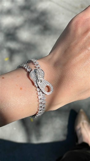 Unzip expectations. 💎 This diamond zipper bracelet transforms from classic sophistication to hauntingly chic — where luxury meets mystery. #diamondzipperbracelets #diamondbracelet #luxury #spookyseasonstyle #diamondstyle #statementjewelry #highjewelry #jewelrylovers #fallfashion #nycjeweler #luxuryjewelry | Marisa Perry Atelier